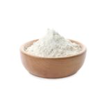 Organic flour in bowl isolated on white